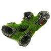 A resin aquarium tree house cave for shrimp and fish, featuring mossy green foliage and dark bark textures.