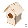 A small, unfinished wooden bird house with a pitched roof and an oval entrance, tied with hemp rope.