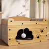 A wooden cat scratcher house and lounge bed with a padded base and a spherical toy inside.