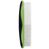 A close-up view of a stainless steel pet grooming comb with green and black handles.