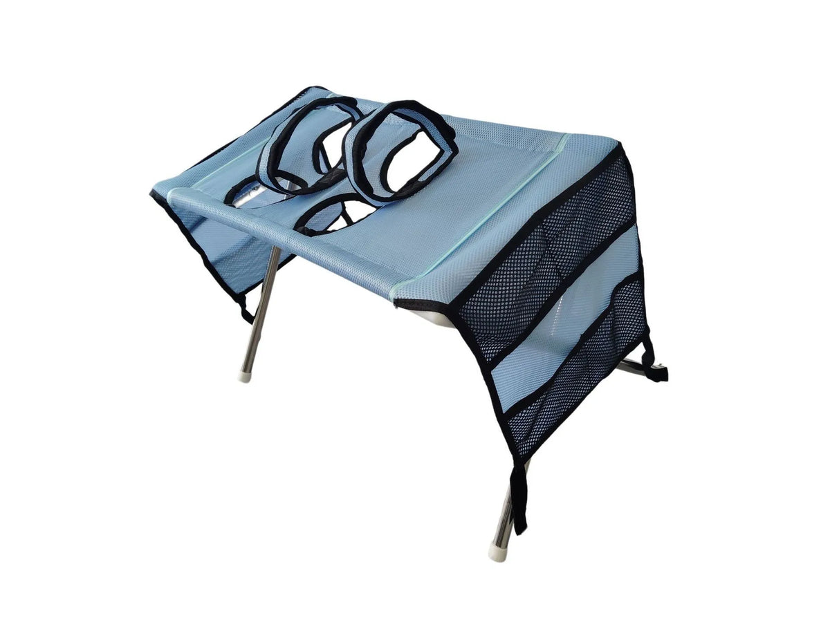 Blue pet grooming hammock with a stand and mesh netting for nail trimming.