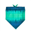 A square tie-dye fabric pouch in shades of teal and blue with a green tie at the top.