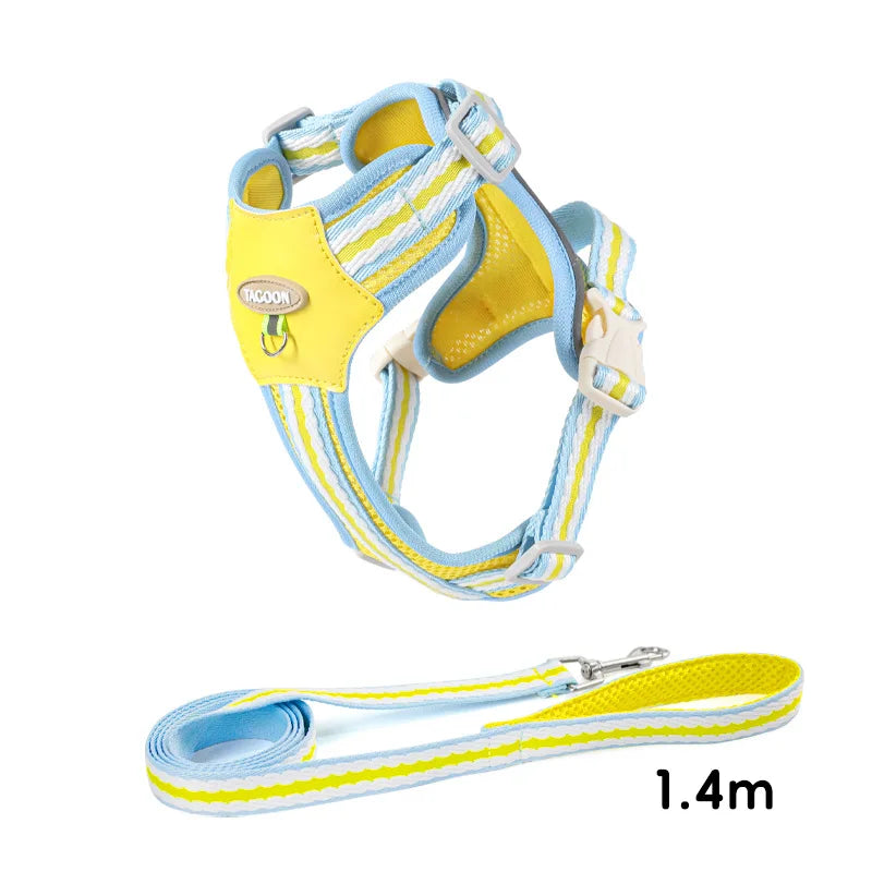 Yellow and light blue adjustable dog harness with reflective straps shown next to a 1.4m measuring tape.