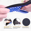 A hand holds a black pet grooming hair remover glove with blue bristles, showing its design and use.