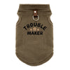 A brown, fuzzy pet jacket for dogs with a leather-look collar and embroidered text that reads Trouble Maker.