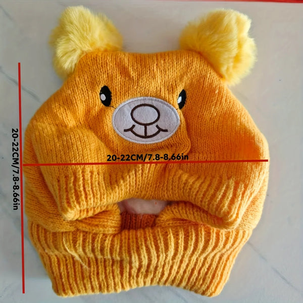 A knitted orange dog scarf and hat set featuring bear ears.