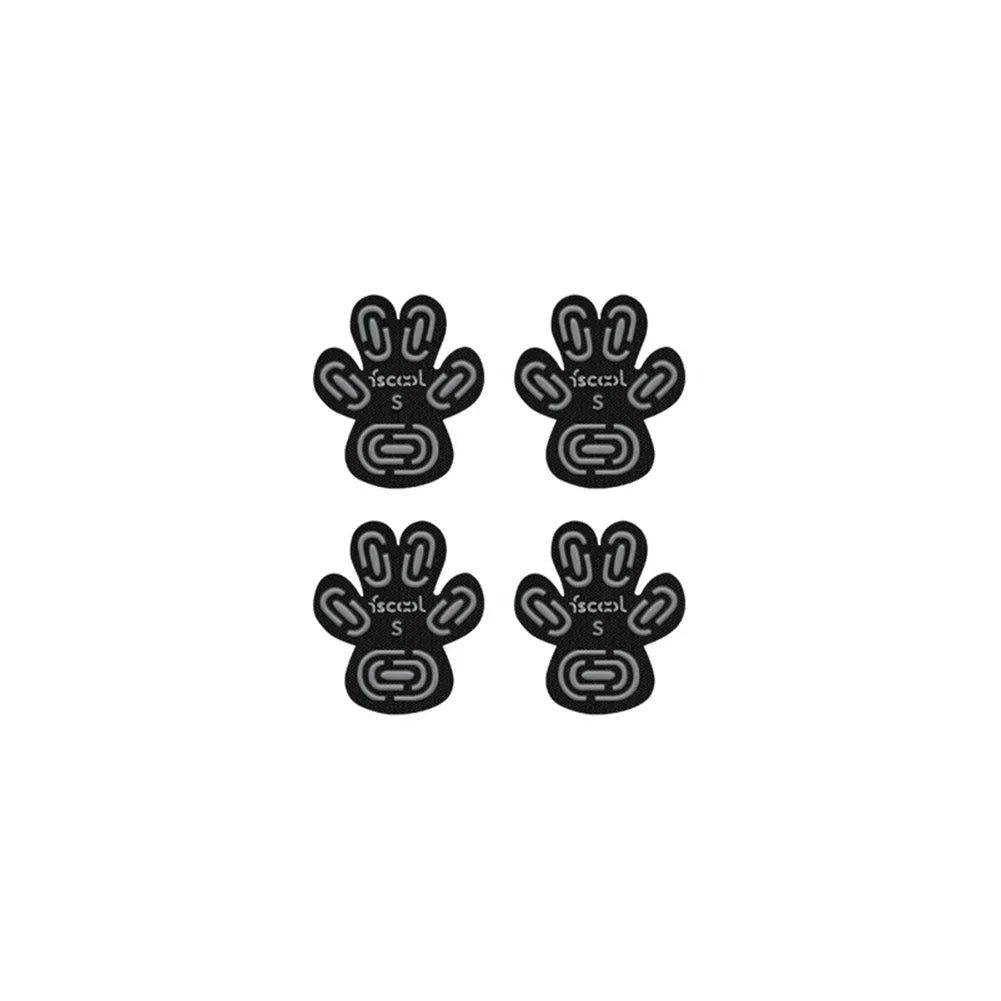 Un juego de cinco agarres para patas de perro negros antideslizantes para seguridad interior y exterior.