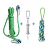 A green cotton rope dog spring pole toy with metal clasps and a blue cord is shown alongside its components.