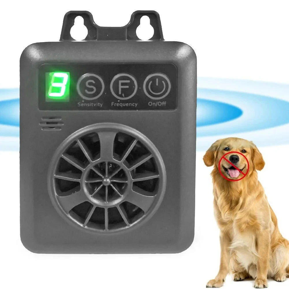 A gray ultrasonic anti-barking device for dogs with an LED display and a circular grille, next to a golden retriever.