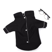 Black luxury silk pet pajamas for a small dog lying flat.