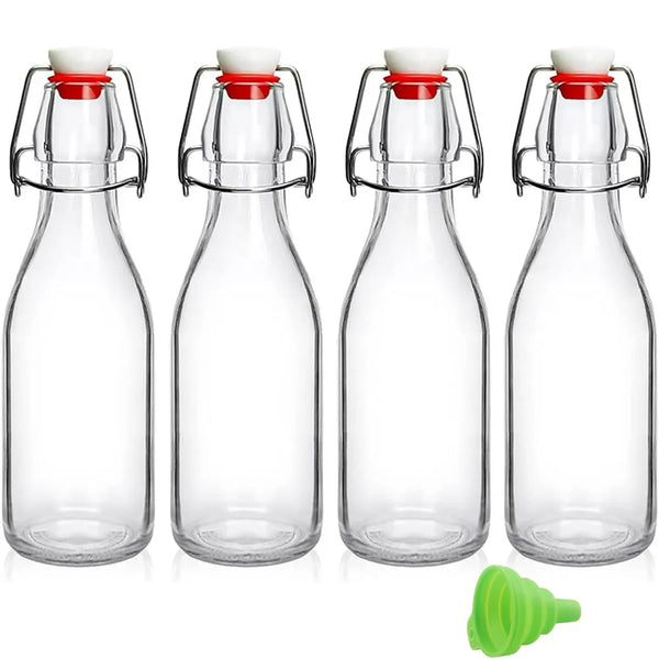 Four clear glass bottles with swing top flip lids and a green silicone stopper shown side by side