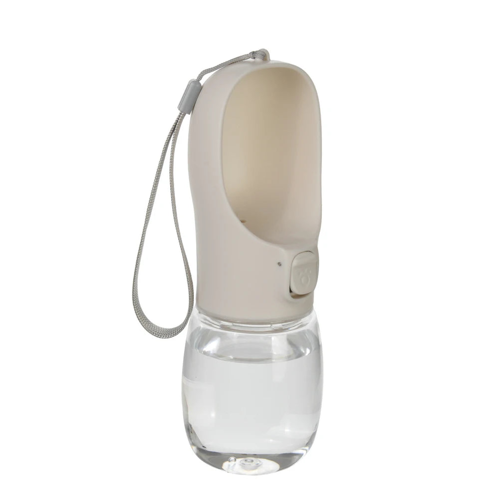 A portable leakproof dog water bottle with a built-in bowl and a flexible tube.