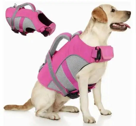 A light-colored dog wearing a bright pink and gray adjustable life jacket for swimming safety.