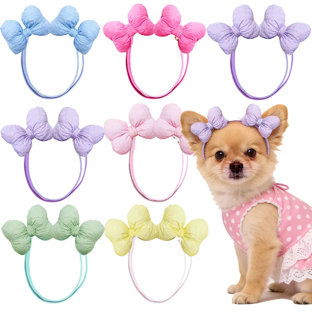 A collection of 30 handmade dog hair bow sets in various colors and styles for dogs.