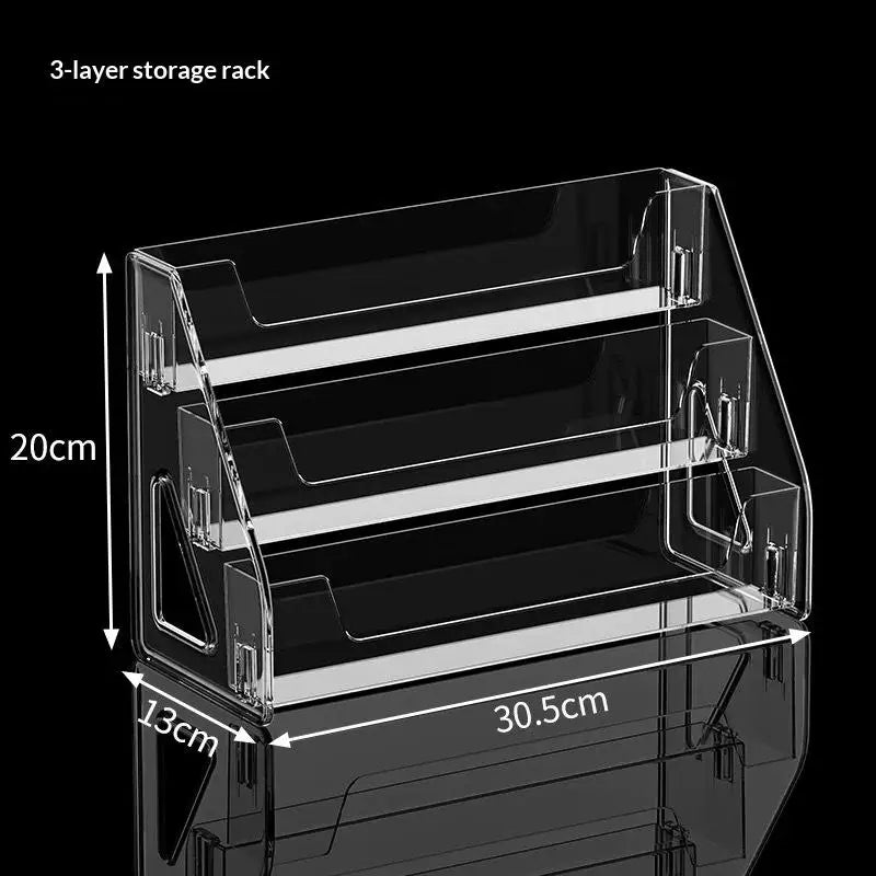A 3-layer storage rack made of clear acrylic, showing its dimensions and structure.