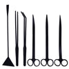 A set of stainless steel aquarium plant trimming tools shown vertically.