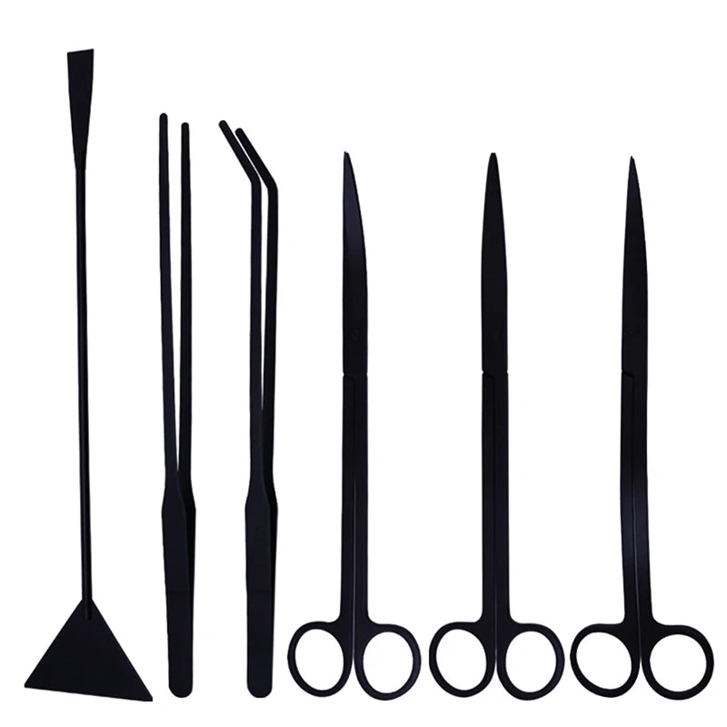 A set of stainless steel aquarium plant trimming tools shown vertically.