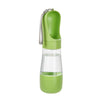 A green 2-in-1 portable pet water and food dispenser with a silicone cap.