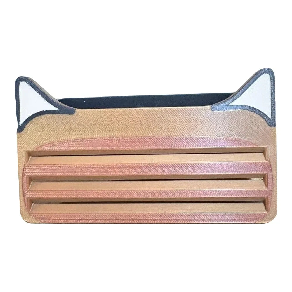 A beige reusable cat food pouch scraper with a dark blue rim and white ears.