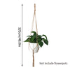 Macrame plant hanger with a macrame cord suspending a green plant pot for indoor or outdoor decor