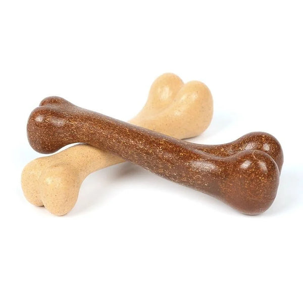 A natural wood chew toy for dogs shaped like a bone, showing various light brown and dark brown tones.