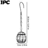 A decorative hanging metal bird feeder with a wire cage and a long chain for garden use.
