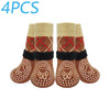 Four pairs of brown and tan anti-slip dog traction socks with knitted cuffs