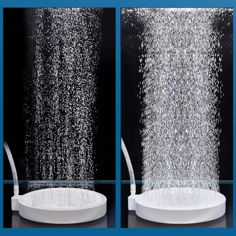 Close-up view of an aquarium air stone disc diffuser creating a fine spray of water.