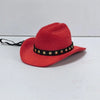 A bright red felt cowboy hat with a black band adorned with gold stars.