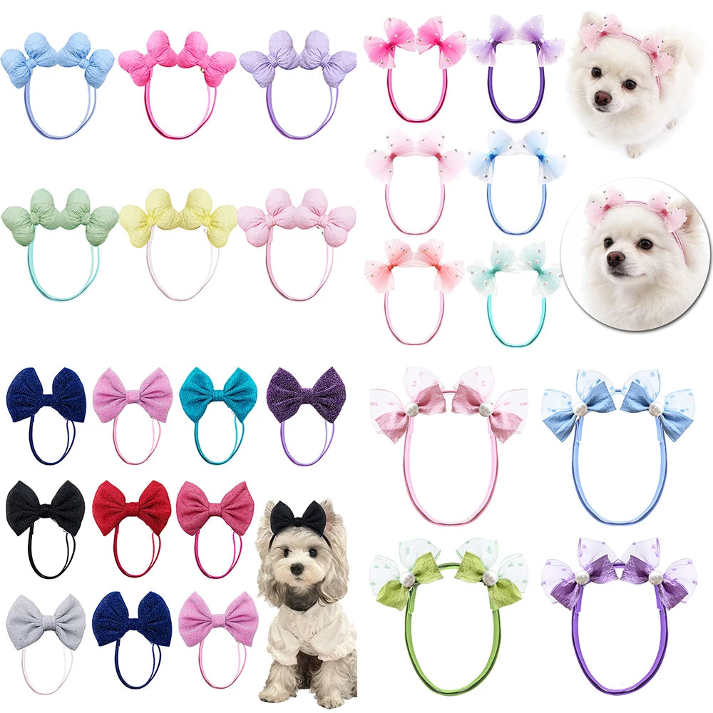 A collection of 30 handmade dog hair bow sets in various colors and styles for dogs.