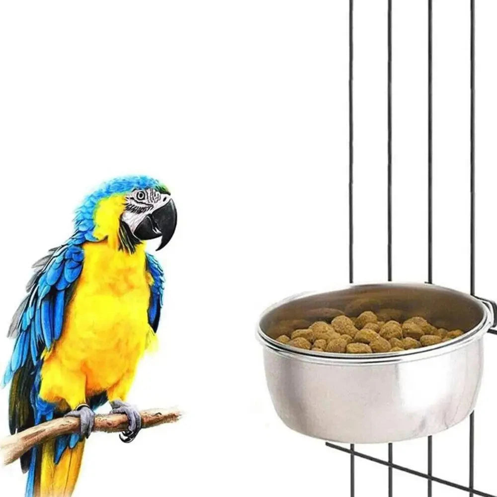 Stainless steel clamp-on pet feeding bowl for bird cages with a yellow and blue parrot.