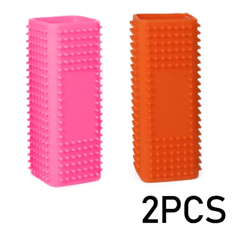 Two silicone pet hair removal brushes, one pink and one orange.