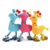 Three colorful plush bone dog squeaky chew toys in blue, pink, and yellow for teething and play