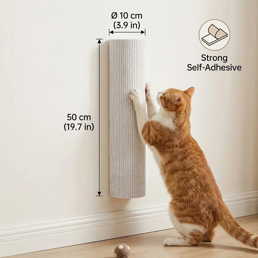 An orange tabby cat is interacting with a cylindrical scratching post mounted on a white wall.