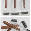 A set of double-sided grooming combs and brushes made of wood and metal, displayed against a white background.