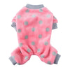 Pink fuzzy dog overalls with gray polka dots and a gray collar