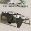 A black stainless steel double pet bowl with an anti-tip design shown on a light surface.