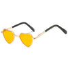 Gold-toned heart-shaped pet sunglasses with amber lenses for cats and dogs