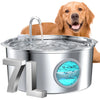 A golden retriever looks over a stainless steel pet water fountain with running water.