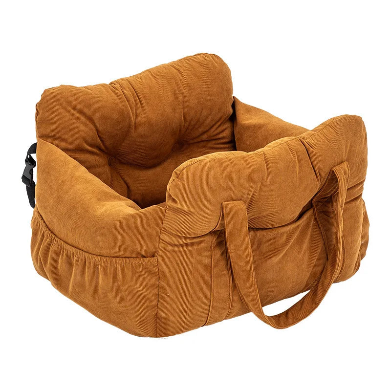 A brown durable pet car seat with safety straps shown from the side.