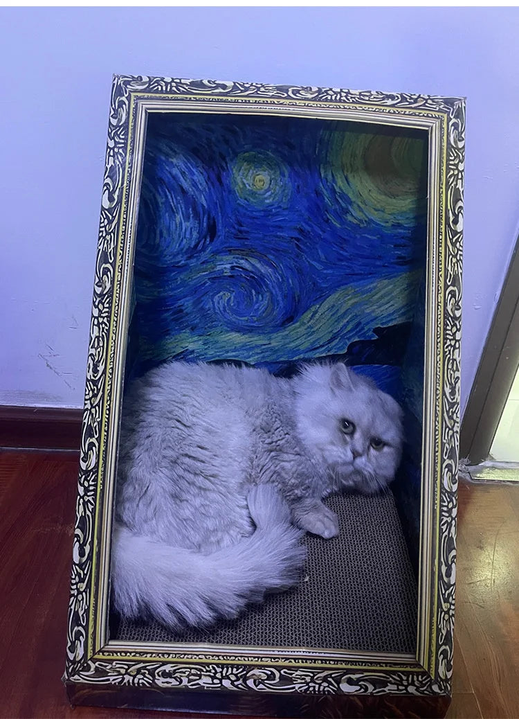 A fluffy gray cat is resting on a rectangular bed with an ornate frame and a patterned scratch pad.