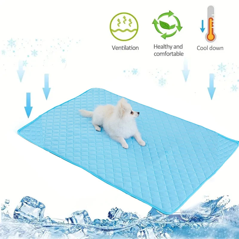 A light blue washable cooling dog mat is shown with a white dog lying on it, surrounded by ice.