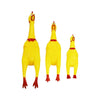 A yellow squeaky rubber chicken dog toy standing upright.