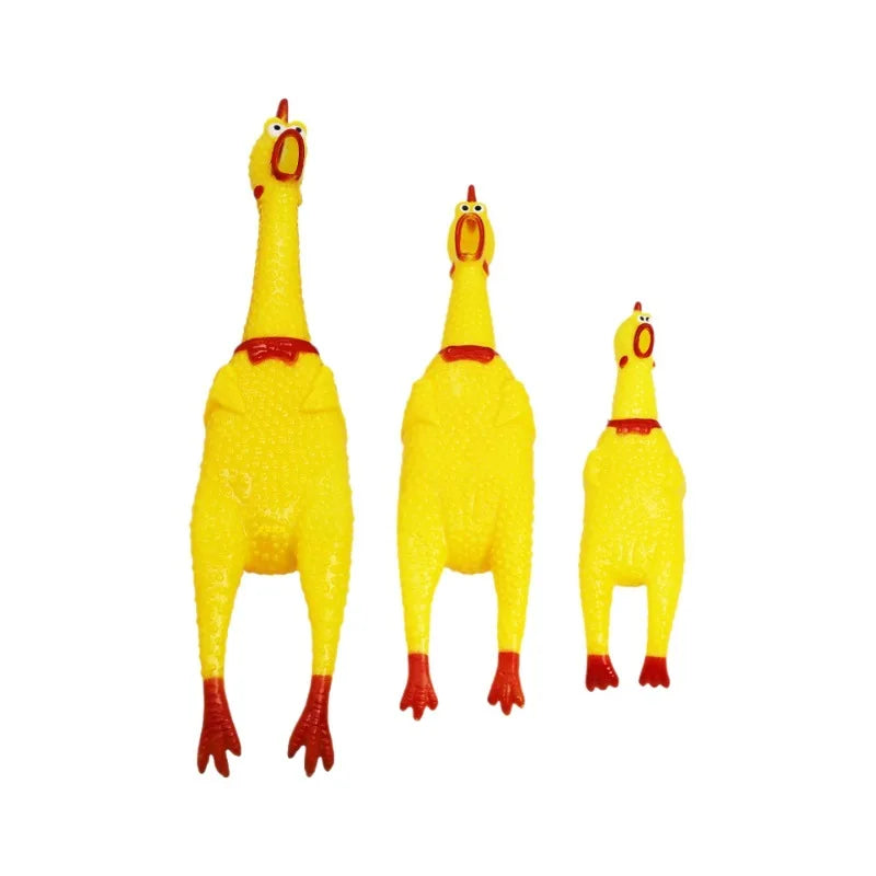 A yellow squeaky rubber chicken dog toy standing upright.