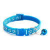 Blue adjustable pet collar with a patterned strap and a blue bell attached.