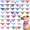 A collection of colorful tie-dye fabric triangles featuring paw prints and hearts for dog accessories.
