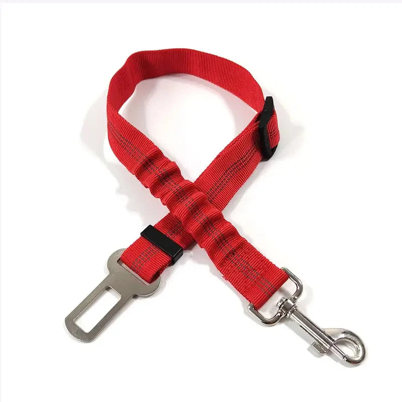 Red reflective dog seat belt with an adjustable nylon harness and metal clip.