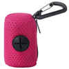 A bright pink reusable dog poop bag with a black clip and a circular black accent.