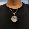 A gold chain necklace features a circular pendant depicting a photo of a child.