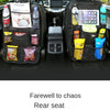 Car backseat organizer with storage pockets and a tablet holder for organizing items.